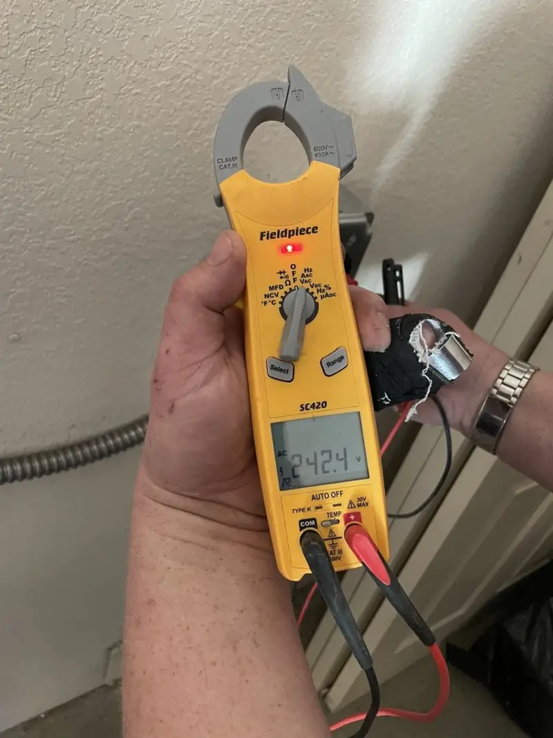 Voltage testing with clamp meter during Outlet Installation in North Charleston